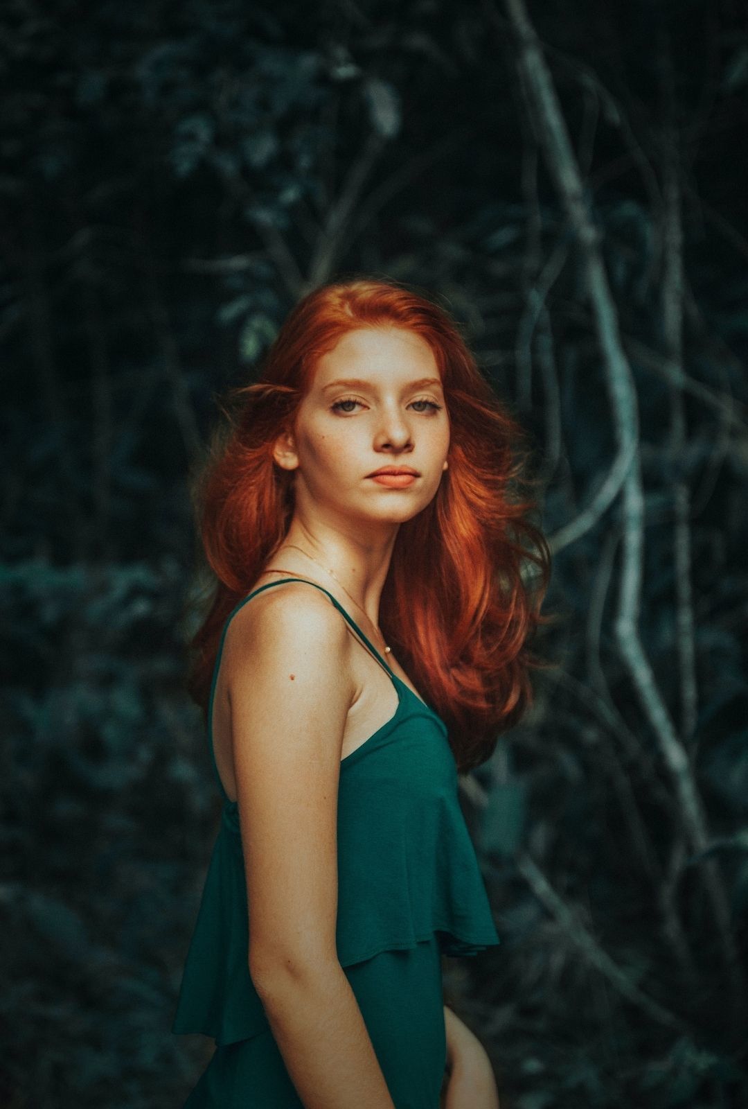 disney hairstyles: woman with long vibrant red hair