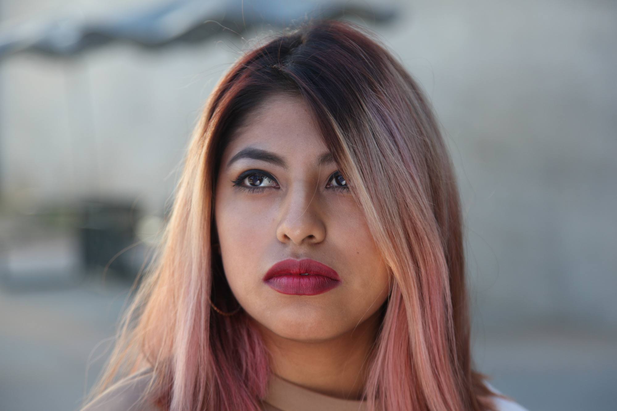 Woman with rose gold hair colour