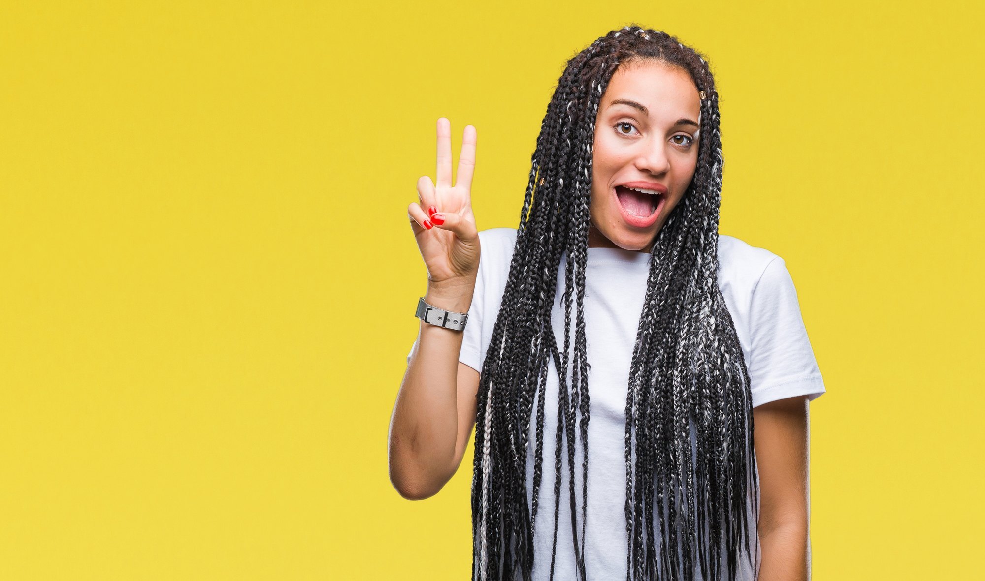 girl with long box braids white highlights