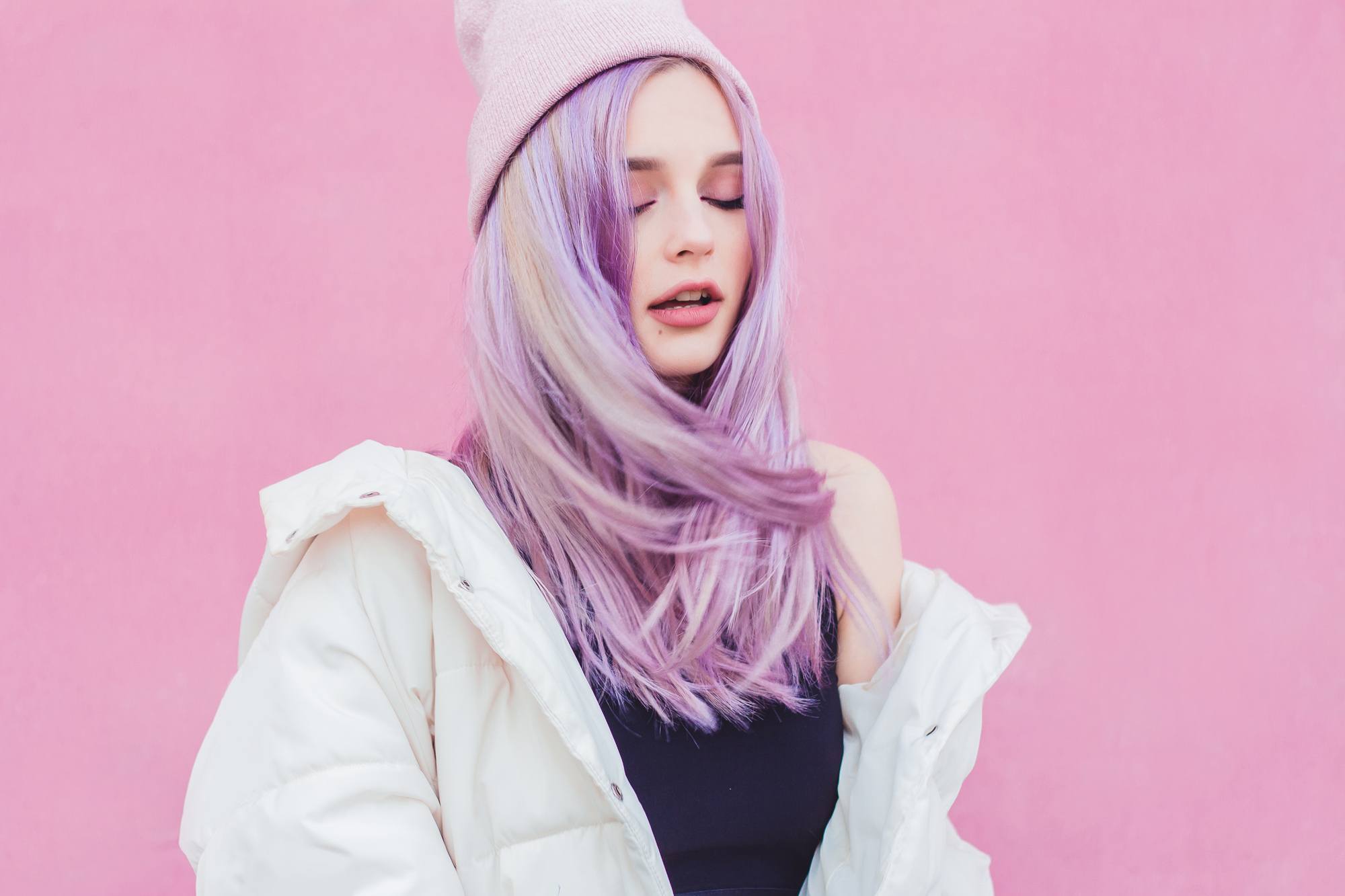 woman with purple hair straight medium hair beanie club hairstyles