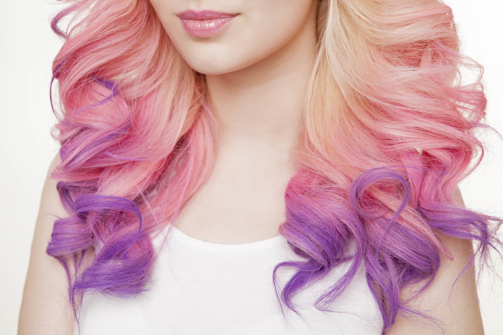 bleached blonde pink purple ombre colour-treated hair