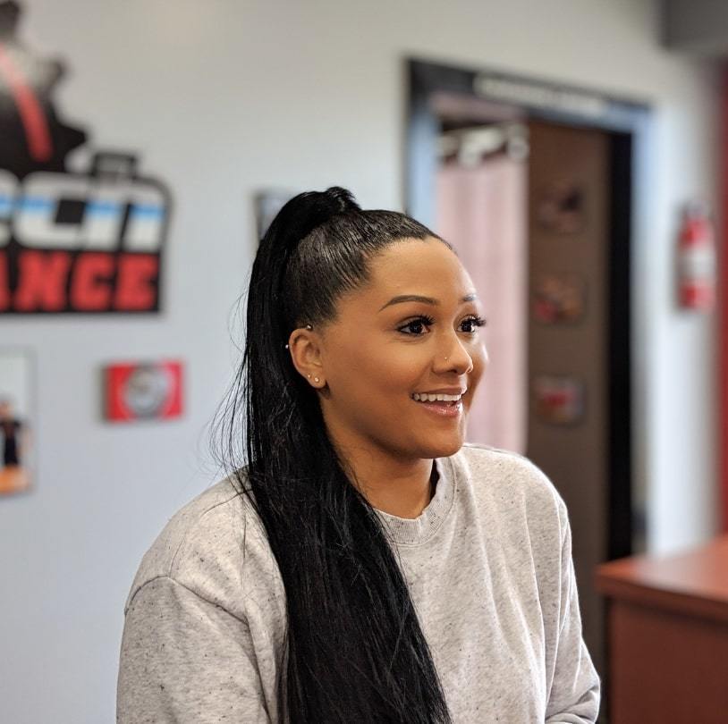Woman wearing a casual high ponytail as a practical hairstyle