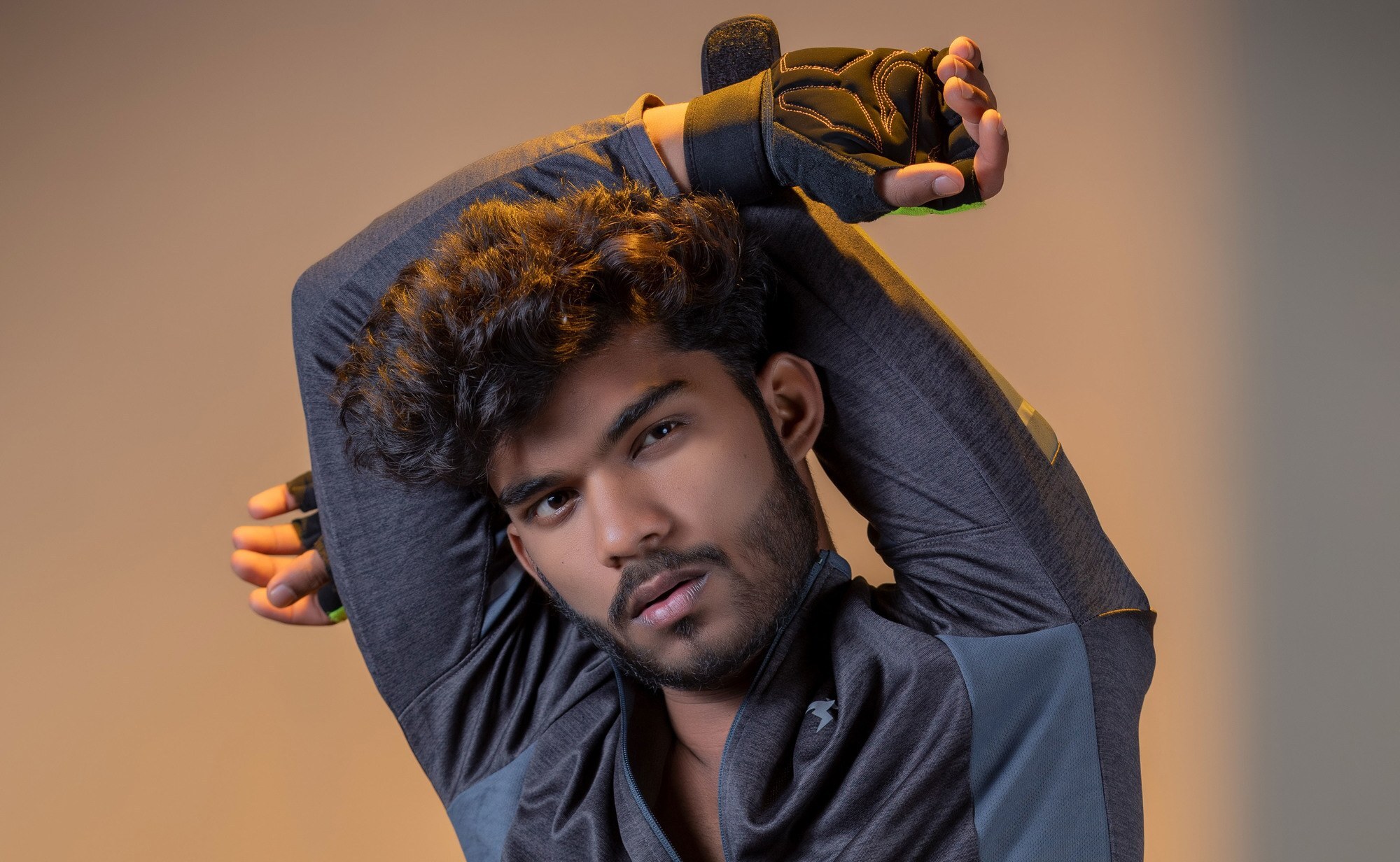 man with short curly hair