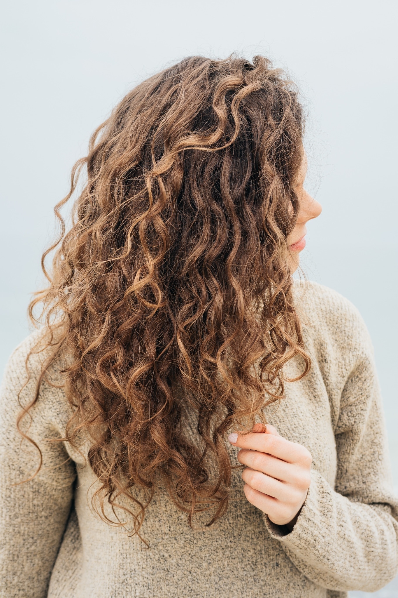 long brown curly hair perm
