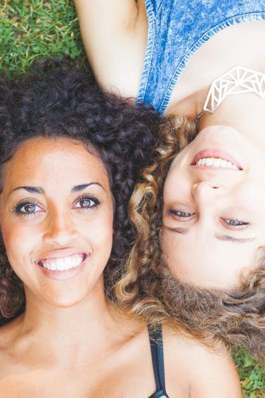 two women curly hair natural hair perm