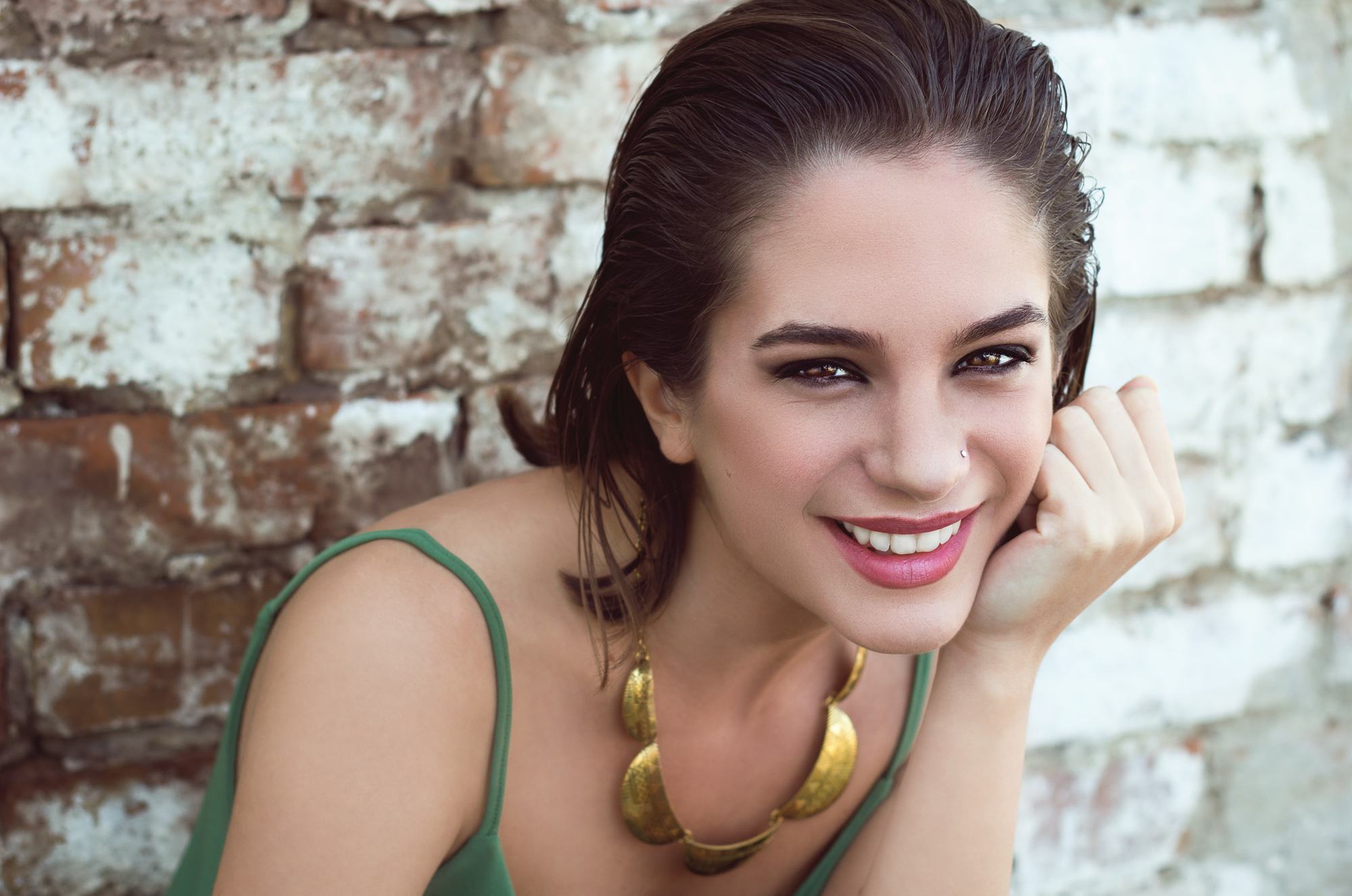 Aquarius slicked-back hairstyle