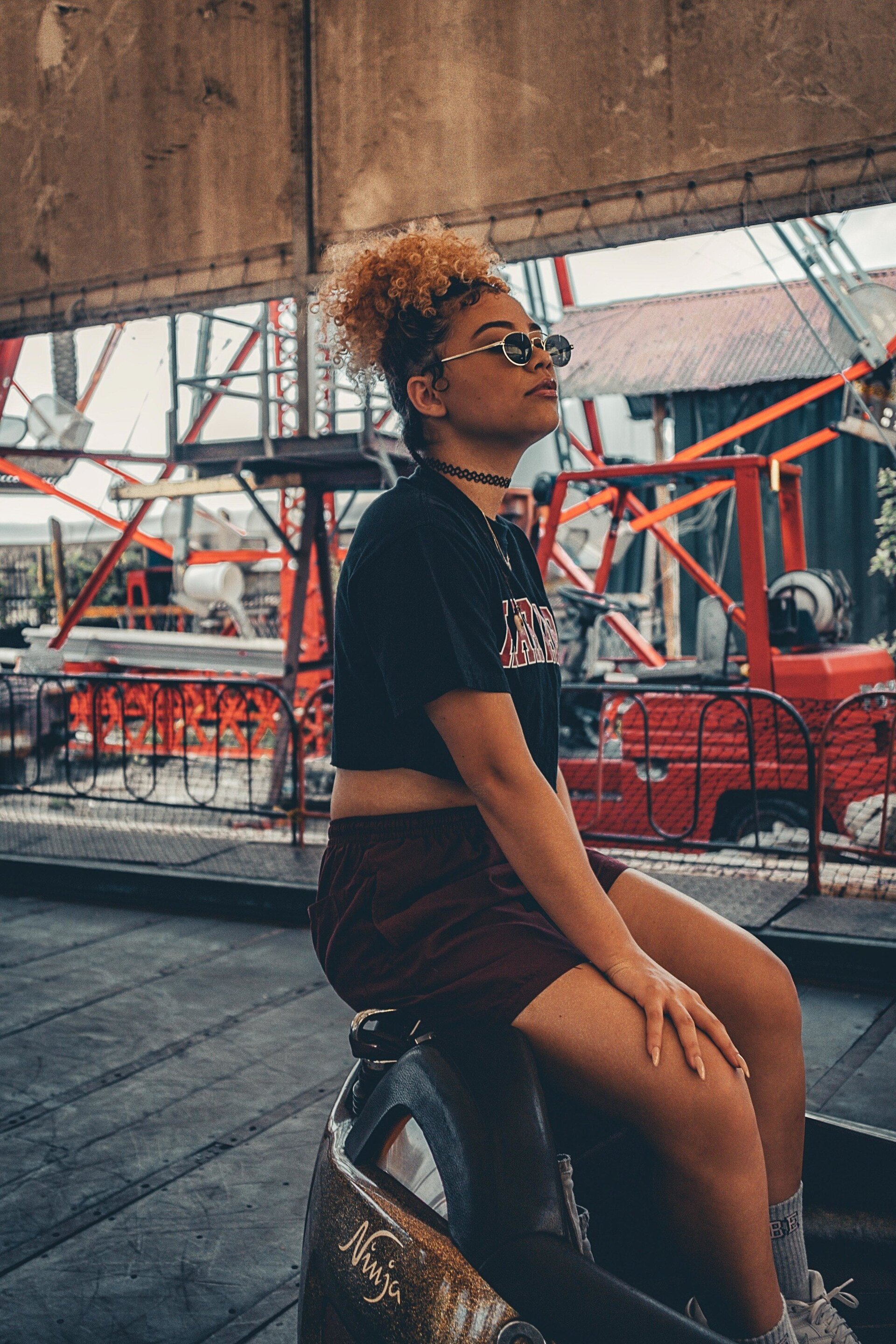 woman with blonde hair and a high puff hairstyle