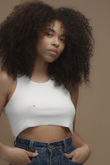 woman with big naturally curly hair