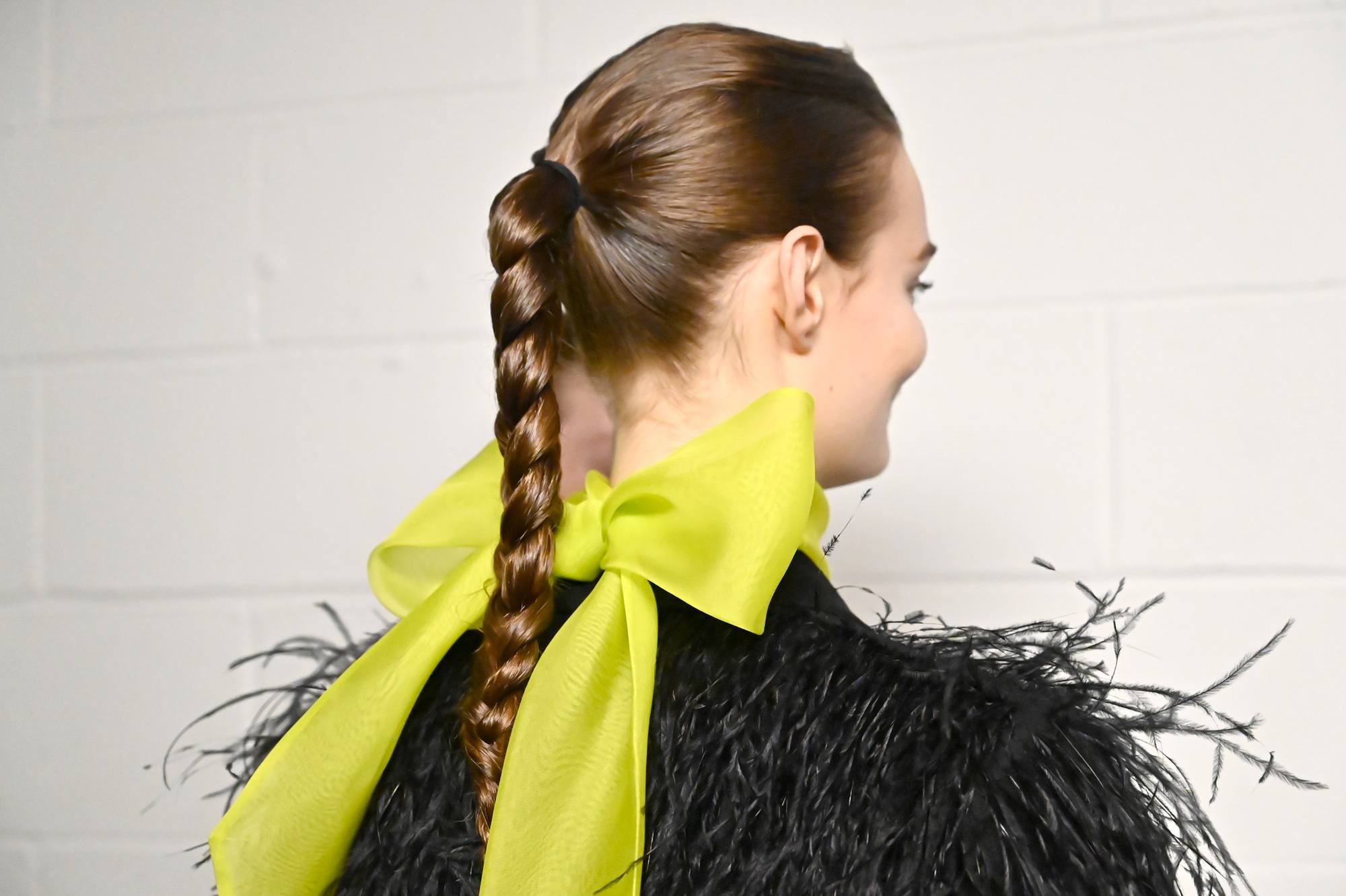New York Fashion Week sleek braided plaited ponytail