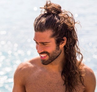 Half-up man bun hairstyle