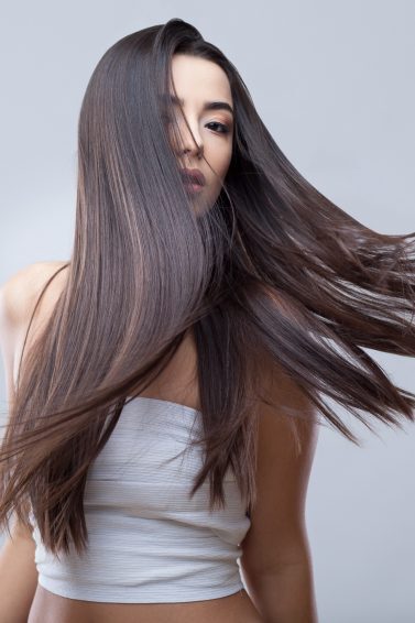 woman with long smooth sleek hair