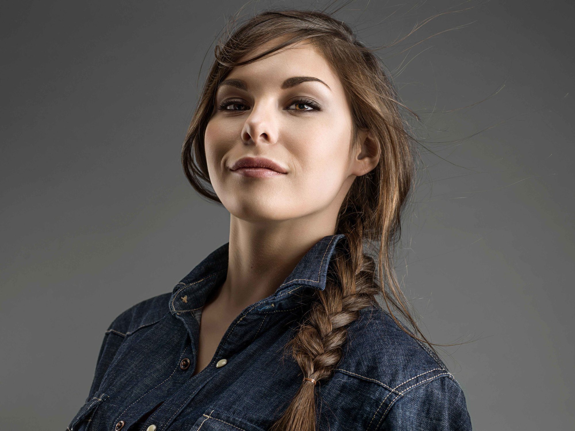 woman with a loose side braid hairstyle