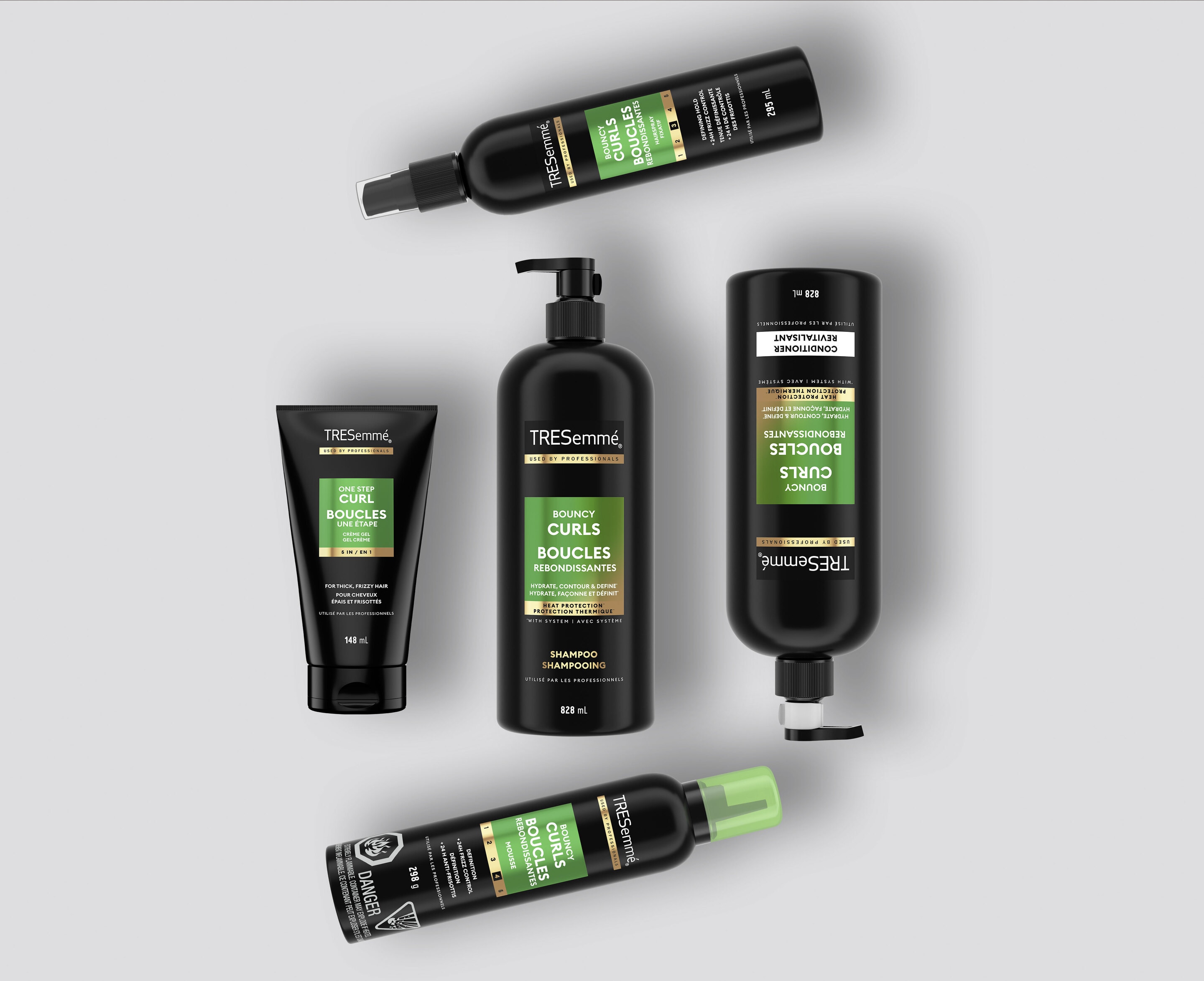 Product shot of TRESemmé Bouncy Curls shampoo and conditioner