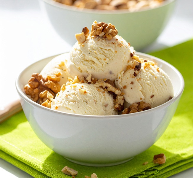 Scoops of Breyers ice cream topped with crunchy nuts