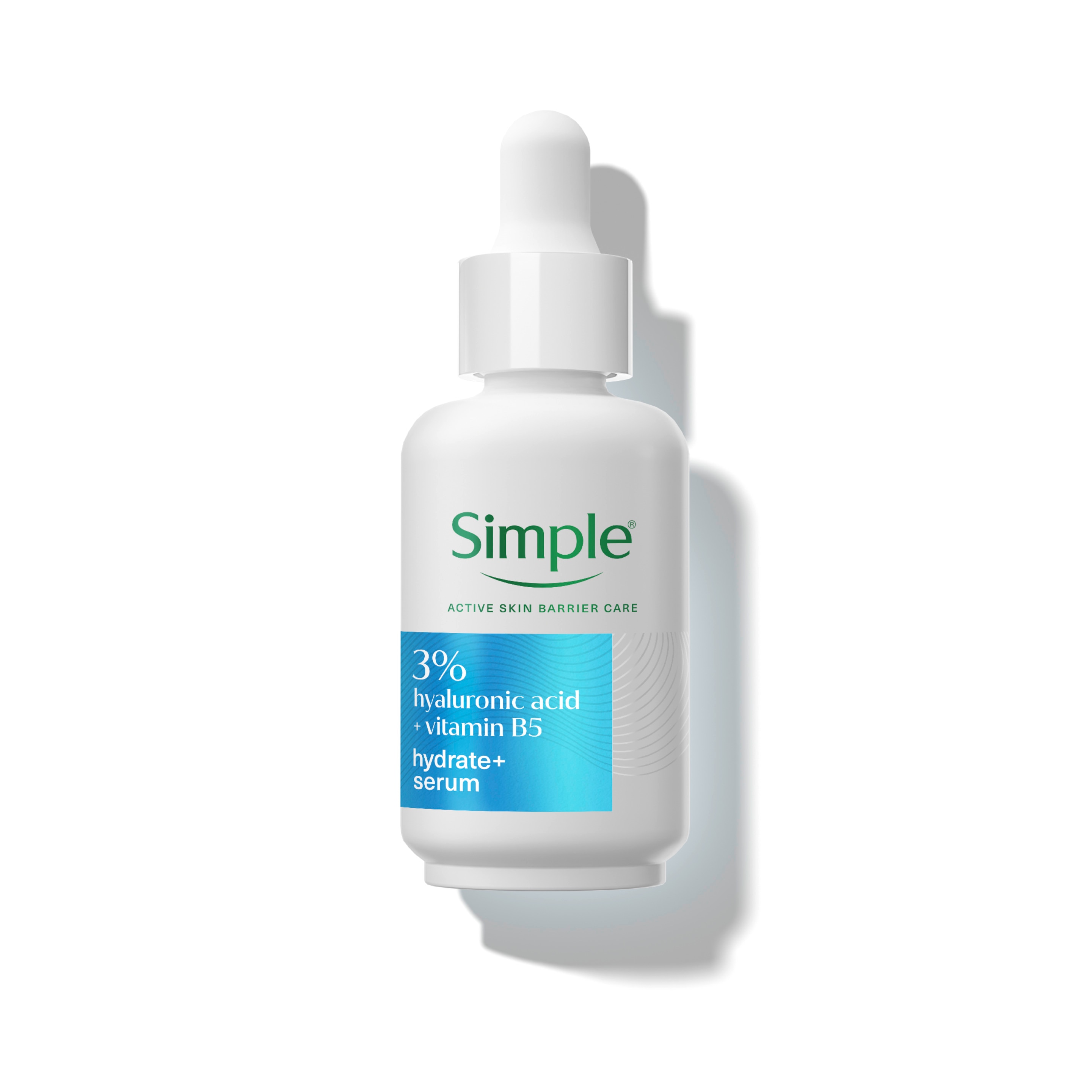 A bottle of Simple Booster Serum next to it's packaging