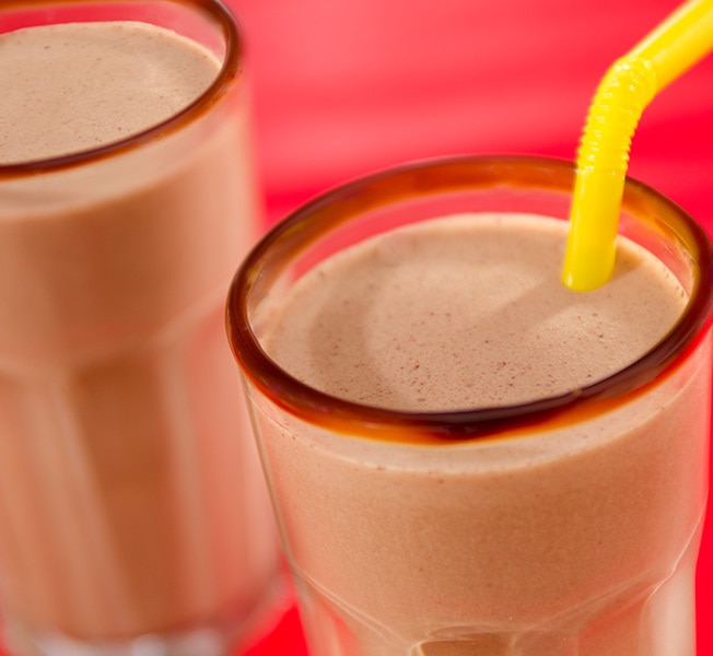 Double chocolate peanut butter milkshake in a glass