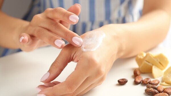 Mix cocoa butter with your lotions and oils