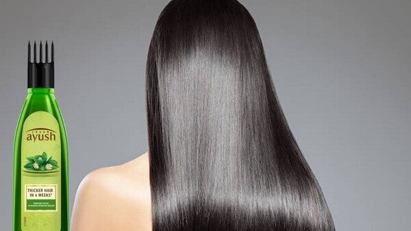 Tips to Treat Heat Damaged Hair Without Cutting Them hair serum