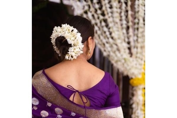 bun hairstyle Bejeweled updos for brides brown hair