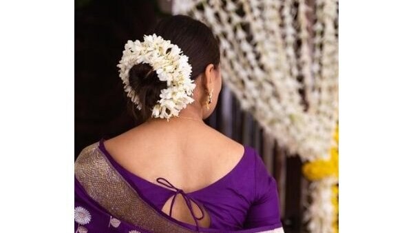 bun hairstyle Bejeweled updos for brides brown hair