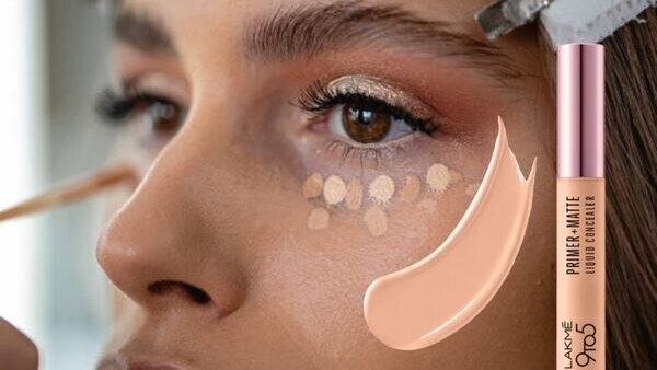 Concealer or Foundation? What is the Difference? woman dark skin brush