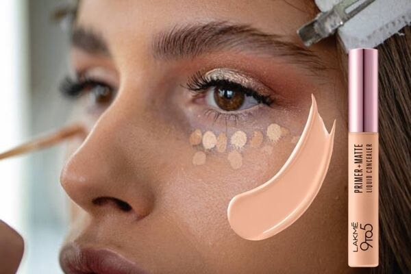 Concealer or Foundation? What is the Difference? woman dark skin brush
