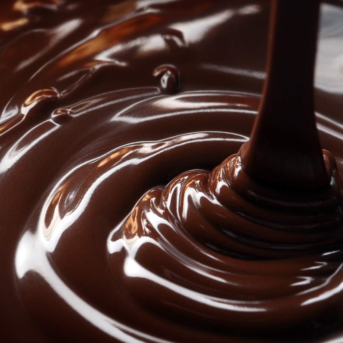 Swirl of melted dark chocolate.