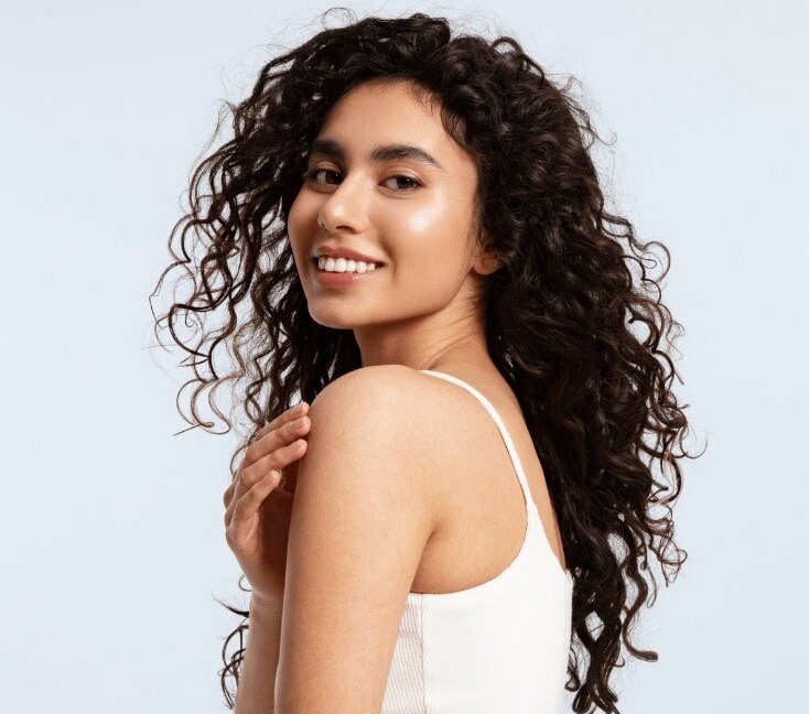 Image of Feather Cut for Curly Hair: Styling and Maintenance Tips