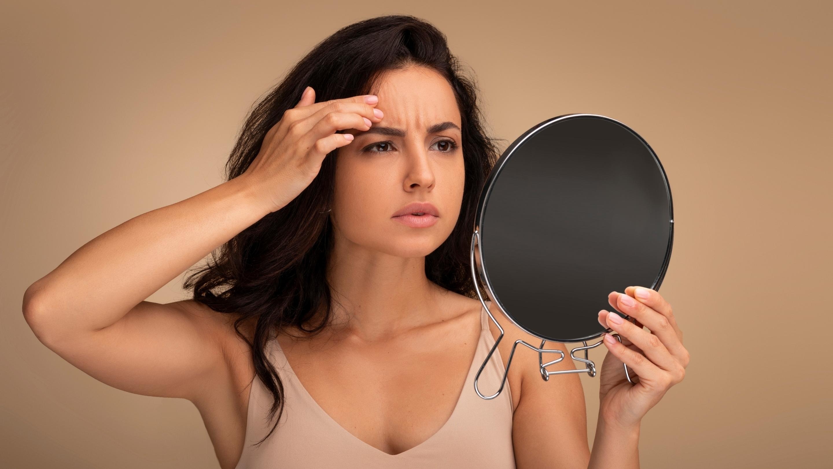 How to Get Rid of Frown Lines: 10 Best Treatments Without Botox