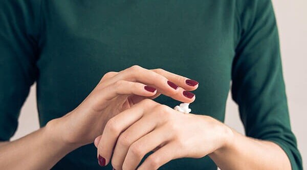 hairstyling products can be a reason for your facial acne