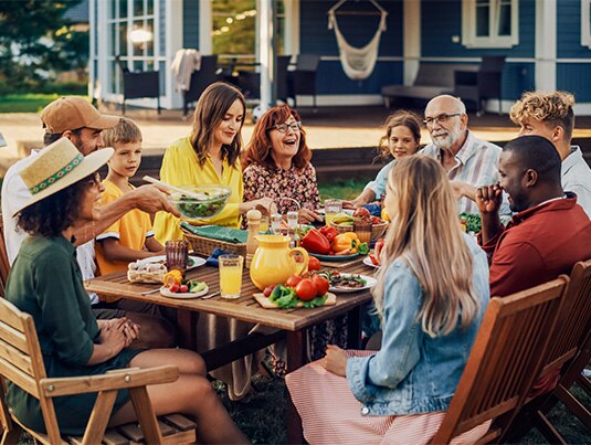 Friends having a barbecue in the garden