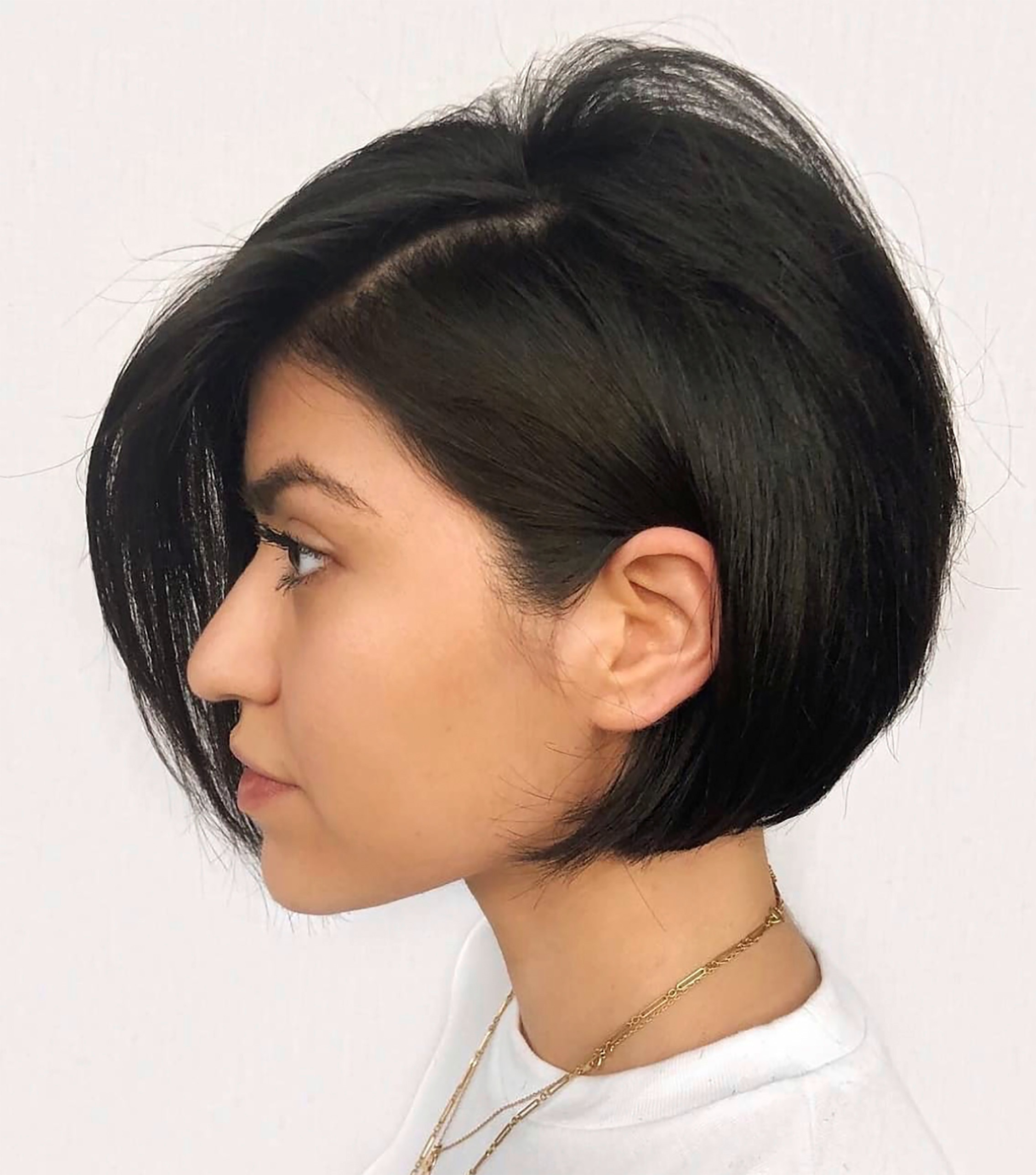 Closeup of a short, inverted bob on an Asian woman