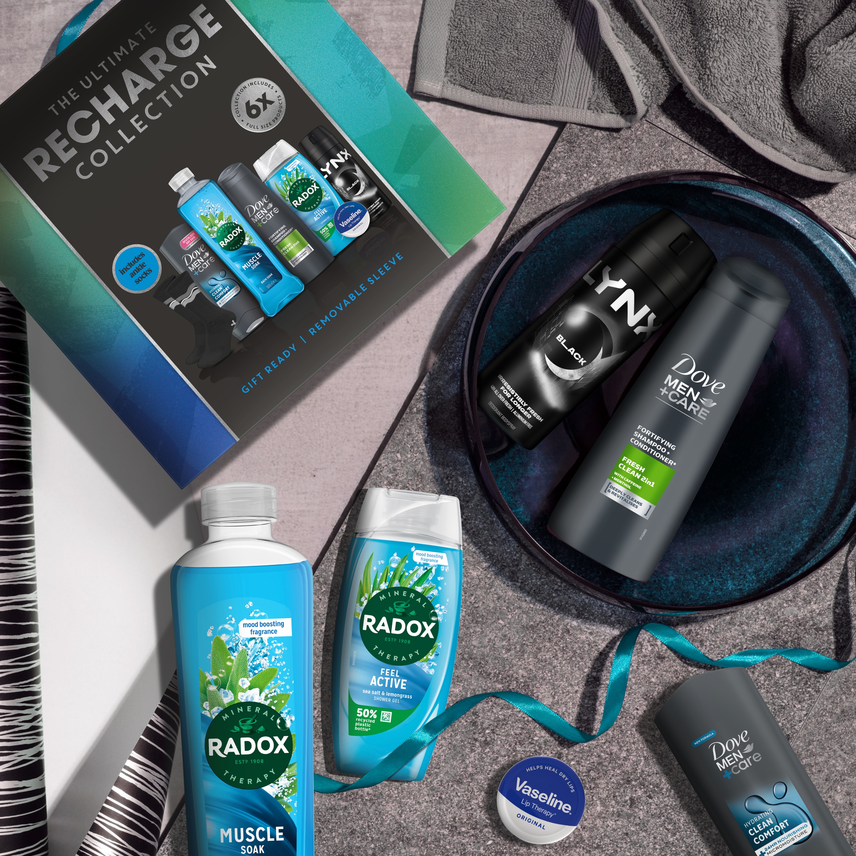 Unbranded Dove Men, Radox, Vaseline & Lynx The Ultimate Recharge Collection body wash, shampoo, bath soak, shower gel, lip balm, body spray & socks Gift Set perfect for any occasion 6 piece packshot