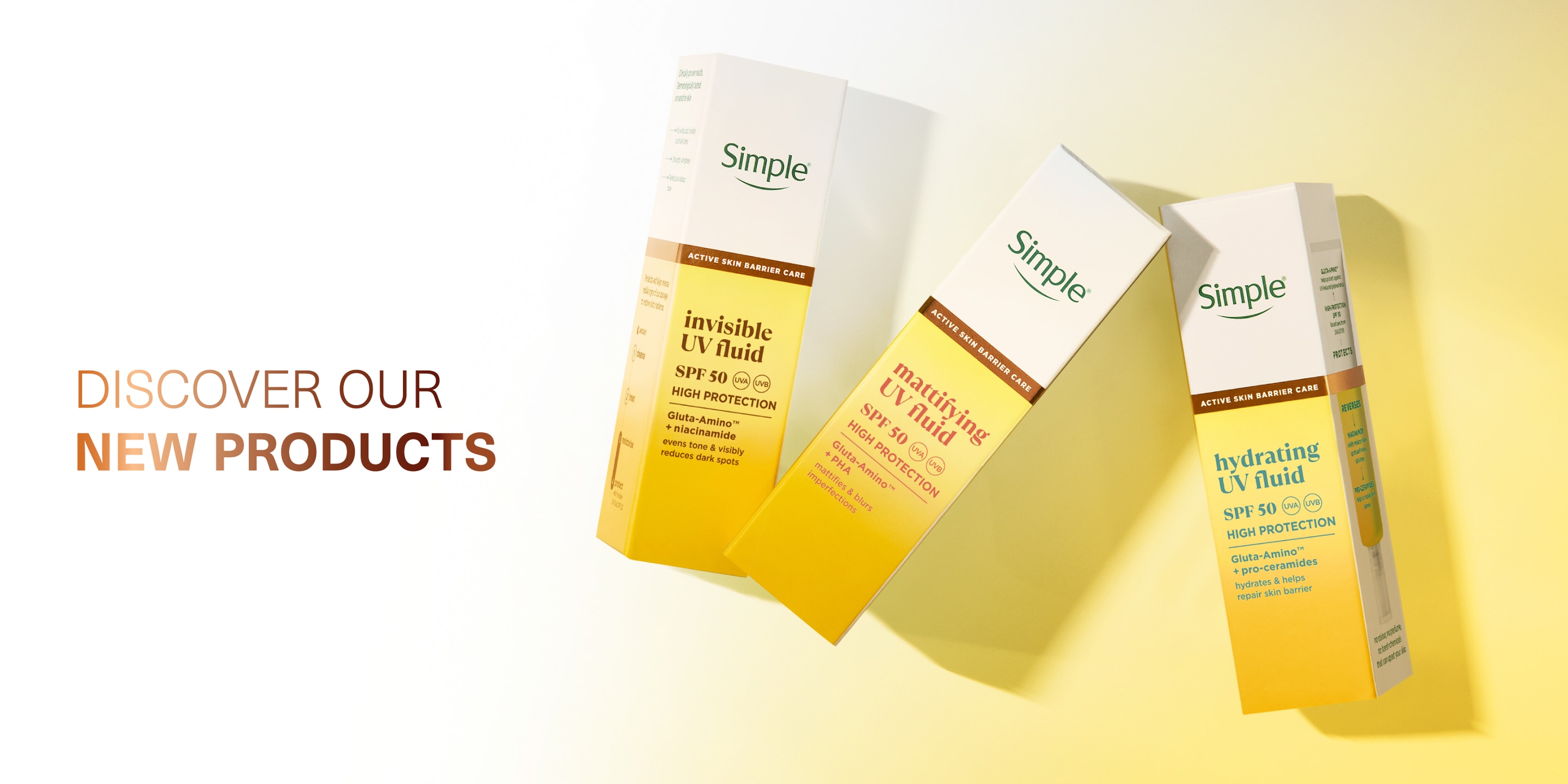 Discover our New Products” with a collection of three Simple Active Skin Barrier Care UV Fluids in their boxes against a light yellow background.