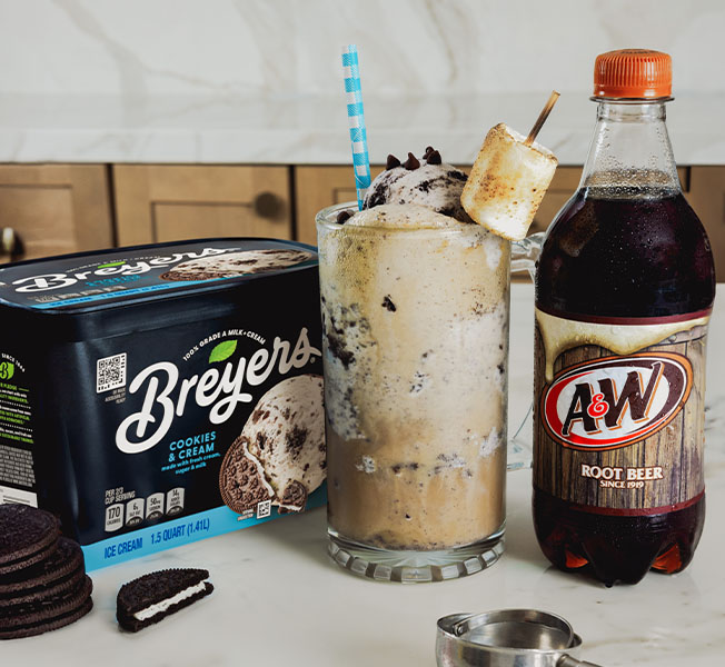 Cookies Fluff float made with Breyers Cookies & Cream and A&W® Root Beer.