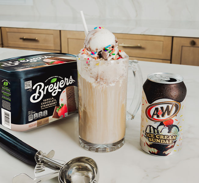 Ultimate float made with Breyers Vanilla, Chocolate, Strawberry and A&W® Ice Cream Sundae Soda.