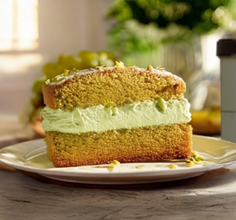 Slice of pistachio gelato cake made with Talenti Pacific Coast Pistachio
