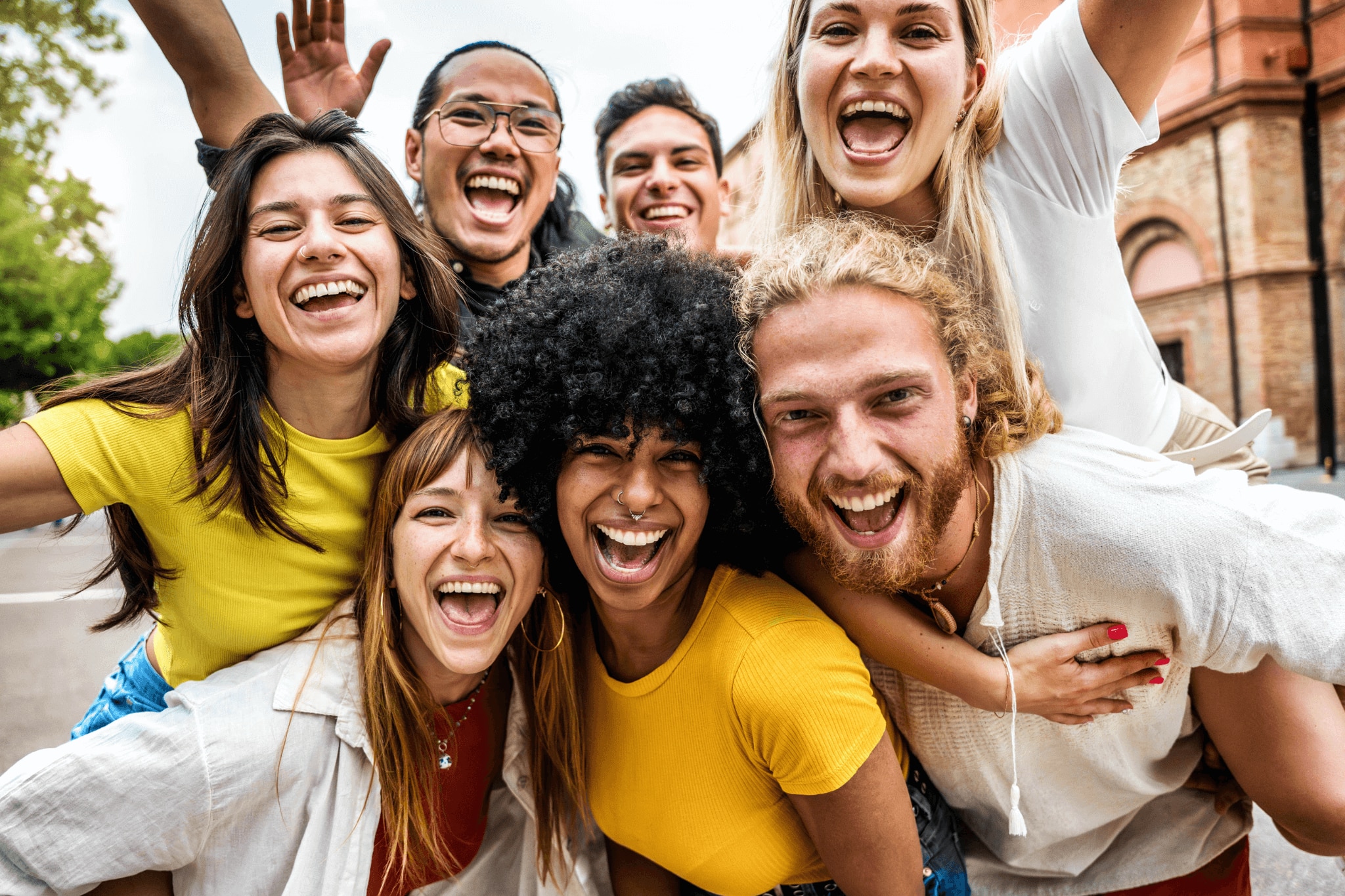 Group of people crowding together with no fear of sweat from hyperhidrosis affecting their lifestyles