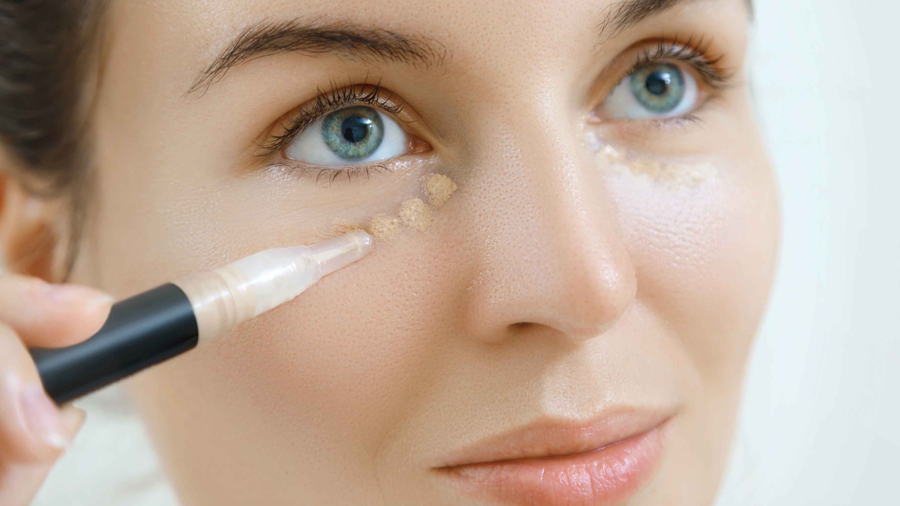 Dot concealer on target areas