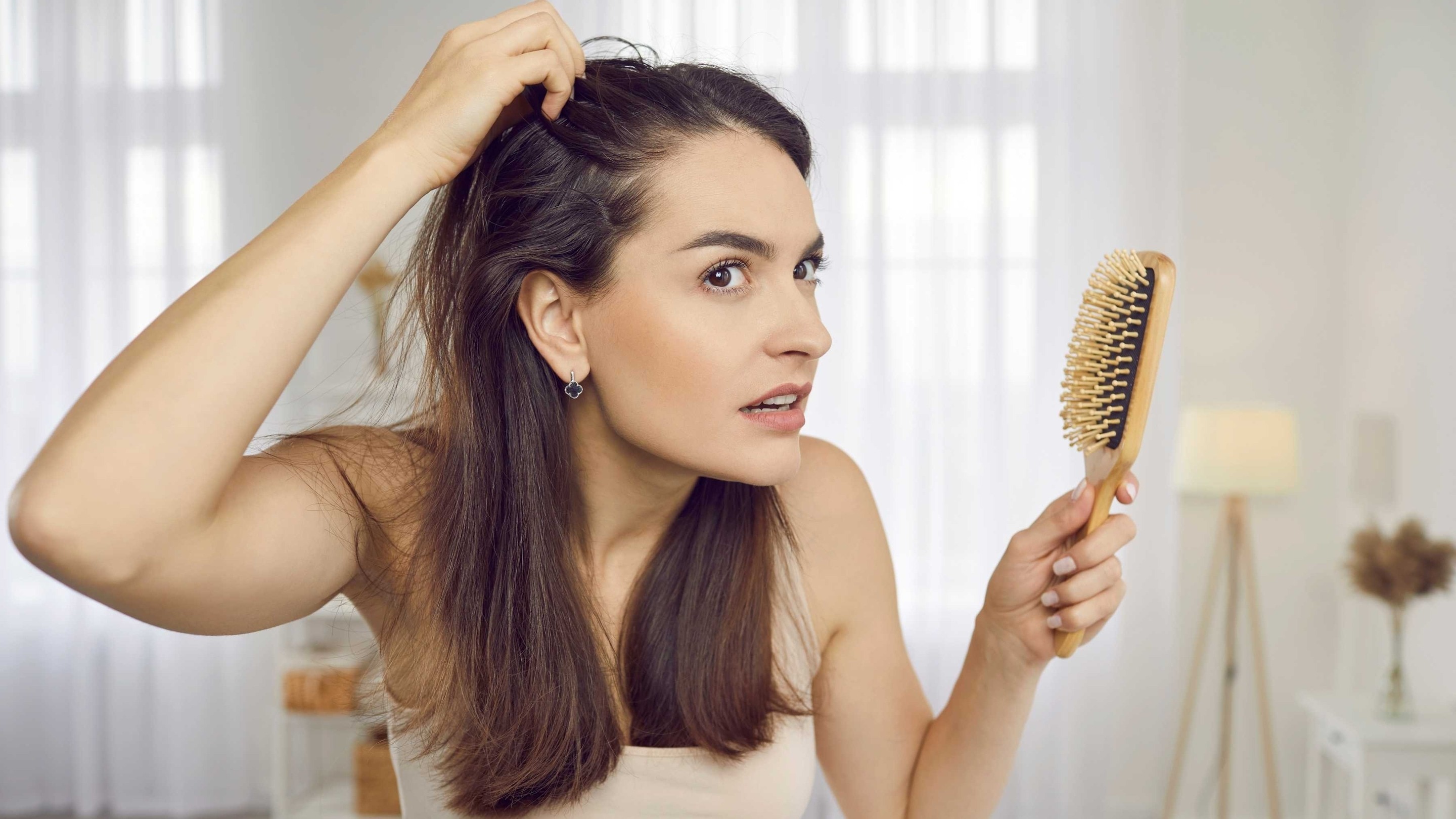 Image of How to Stop and Prevent Hair Fall: Causes, Treatments & Prevention Tips