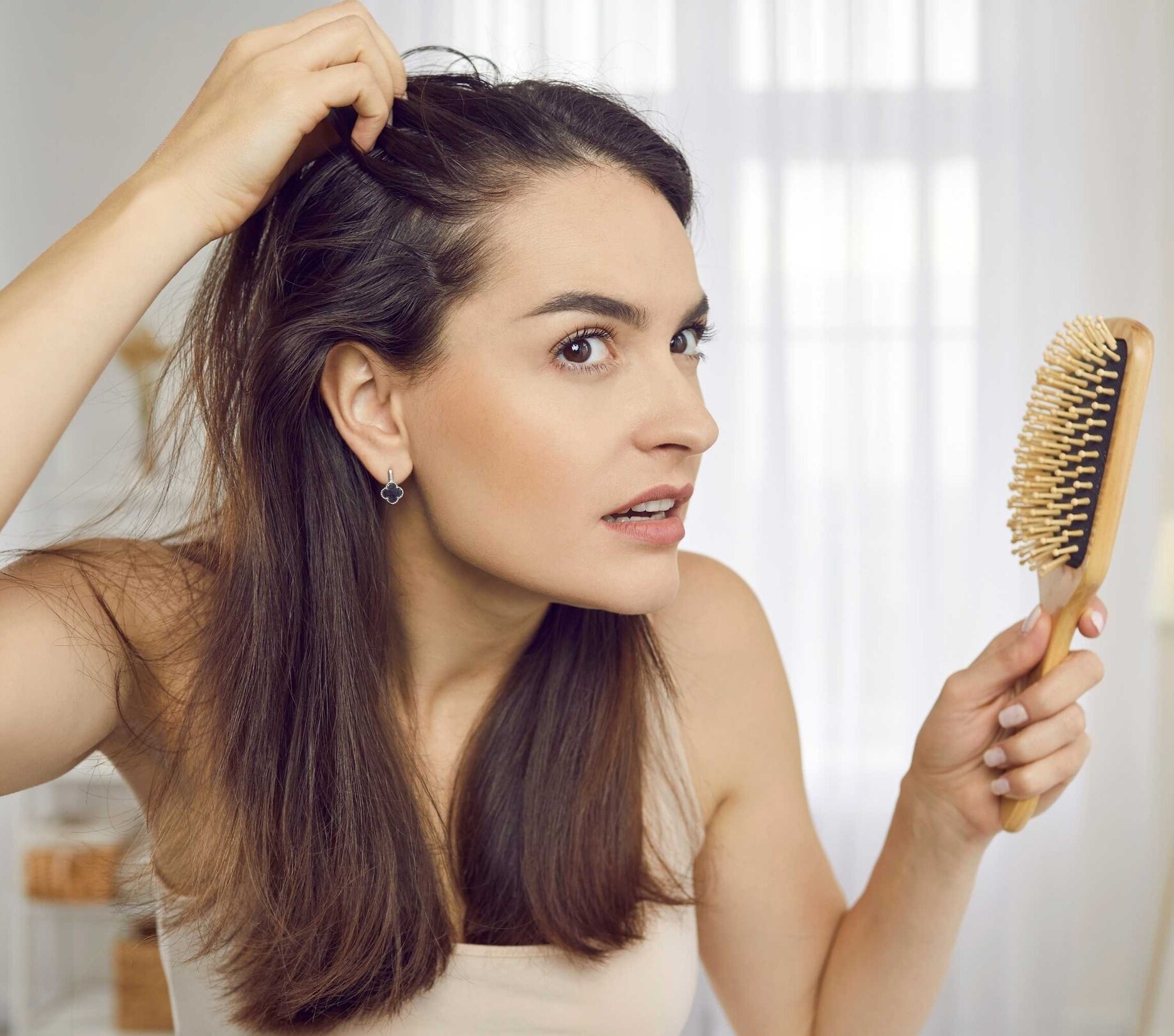 Image of How to Stop and Prevent Hair Fall: Causes, Treatments & Prevention Tips