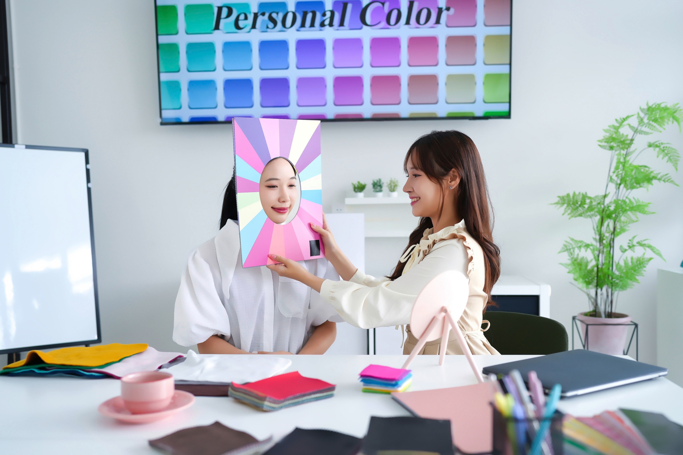 Woman undergoing a color analysis session.