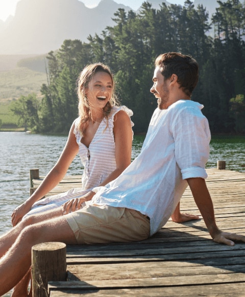 Young couple enjoying a hot Summer day outside