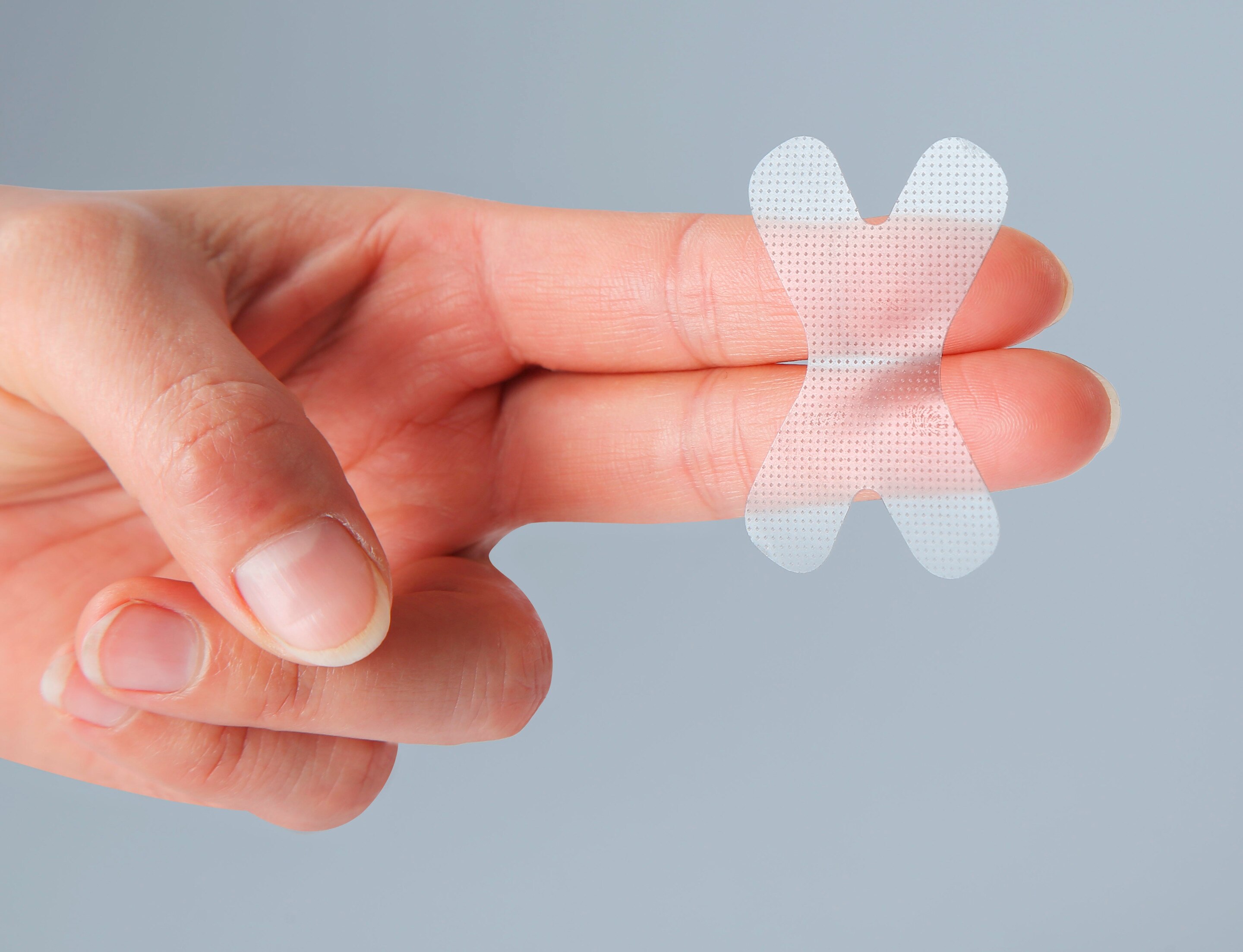 An X-shaped mouth tape.