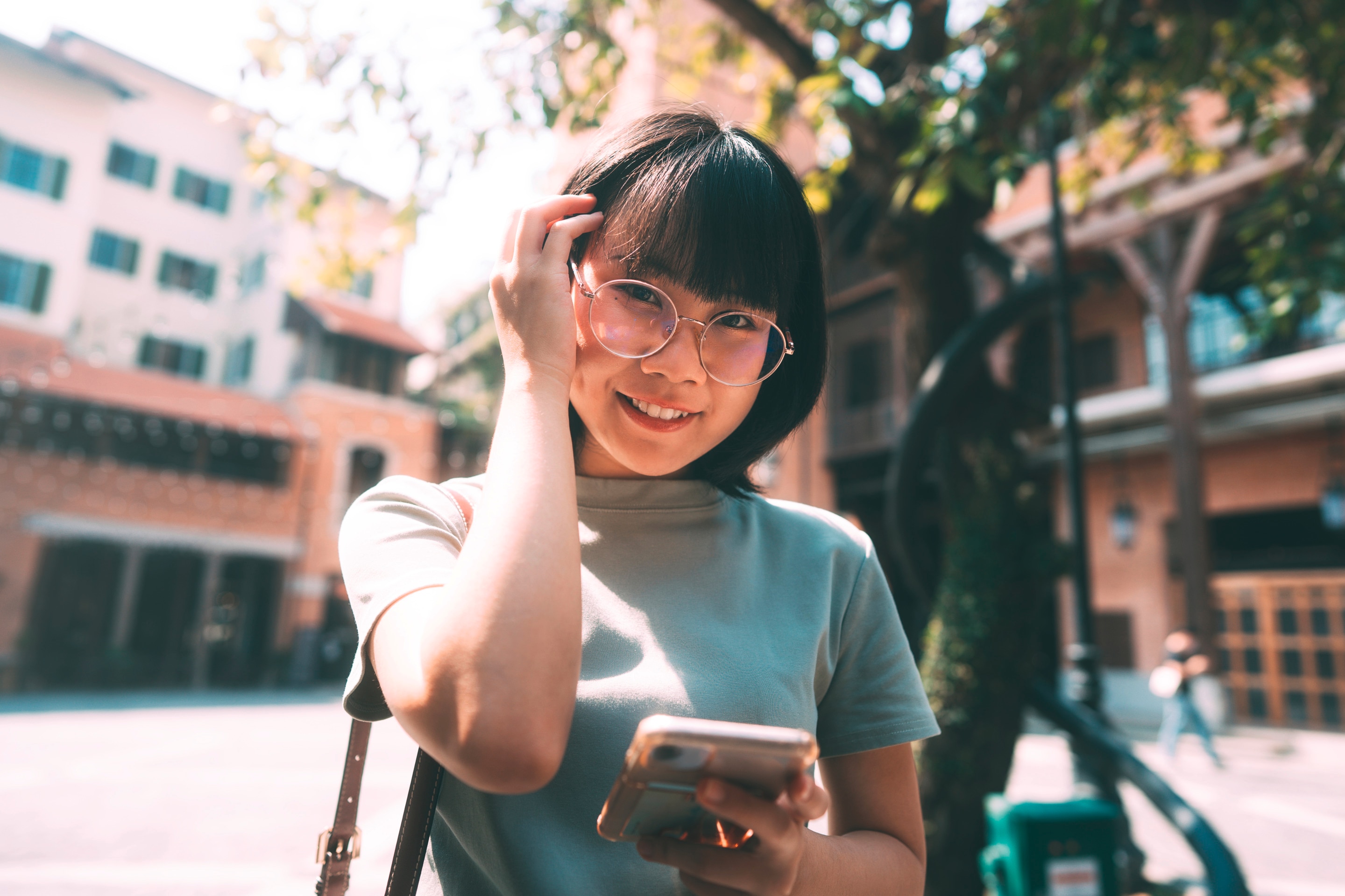 Woman holding a smart phone.