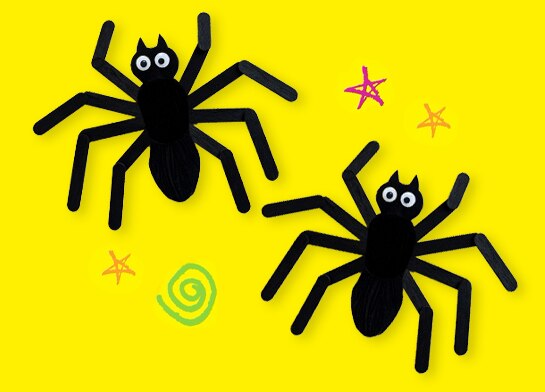 Spooky Halloween Spider Crafts made from Popsicle sticks and googly eyes