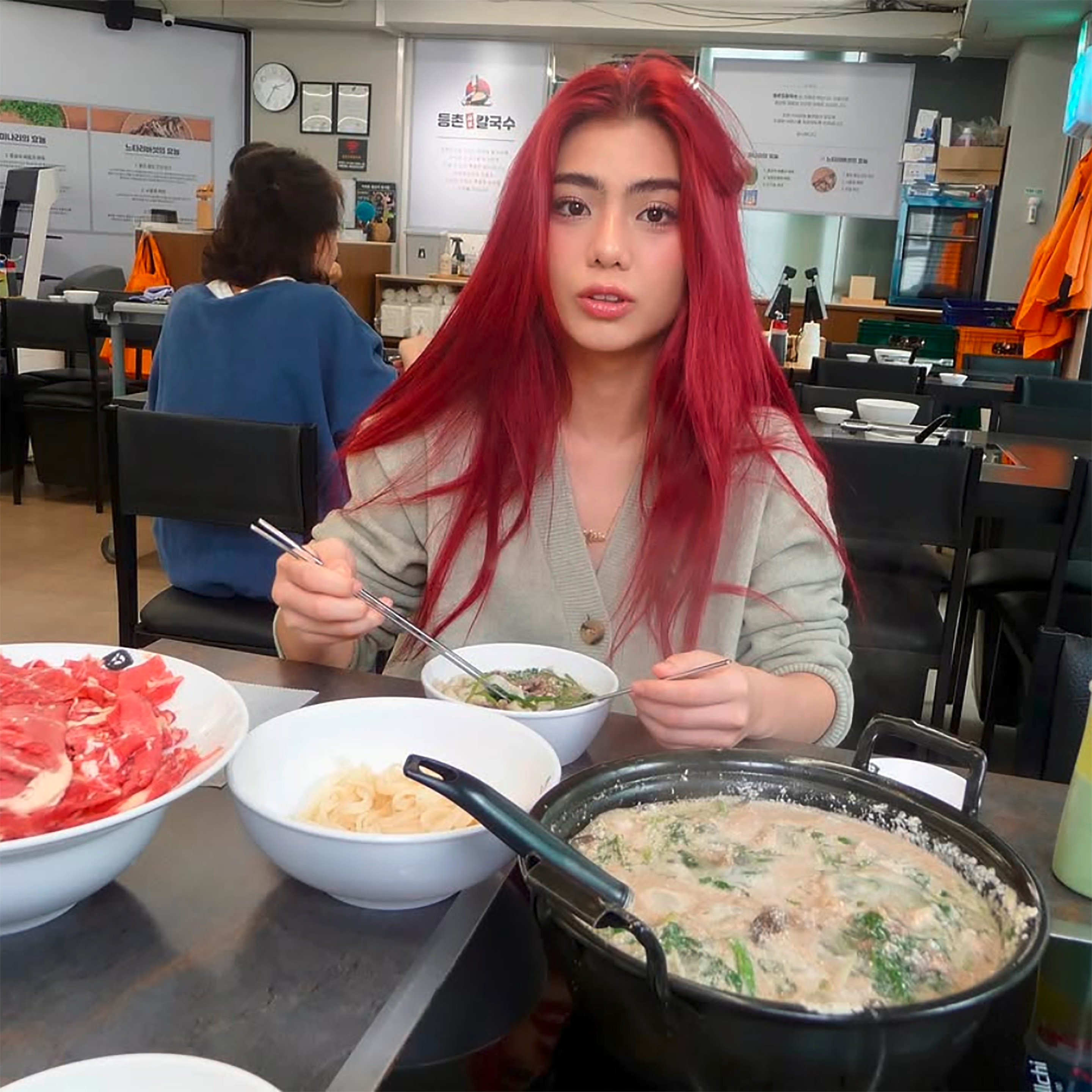 Filipino pop star sports red hair.