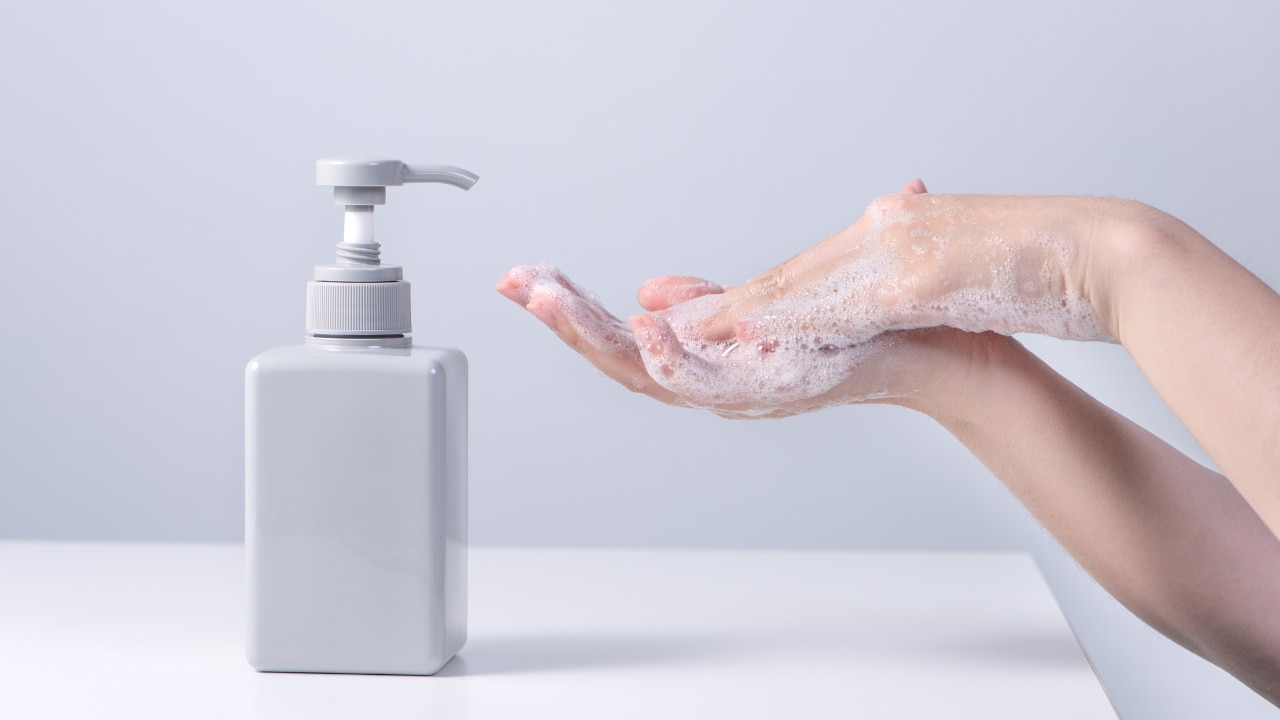 hand and bottle