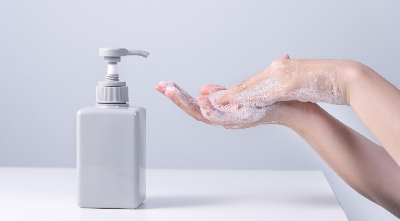 hand and bottle