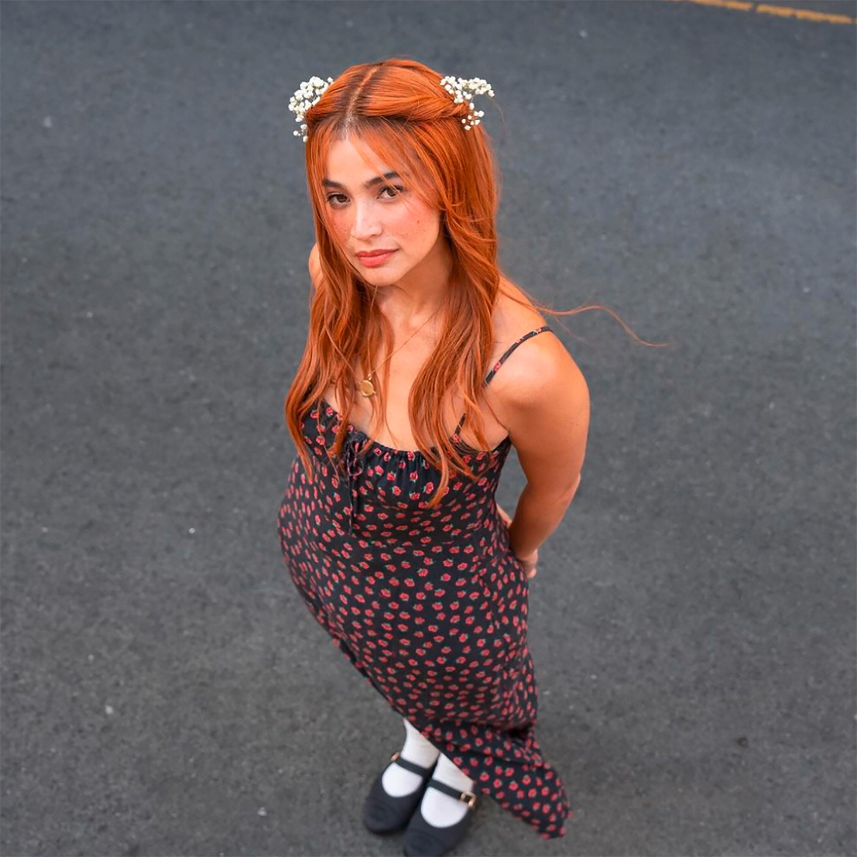 Anne Curtis Smith wearing a sundress, black shoes and white socks.